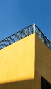 brown concrete wall under blue sky during daytime
